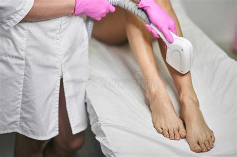 It's never too early (or too late) to get the right treatment for your skin. Young Girl On A Laser Hair Removal Session. Laser Hair ...