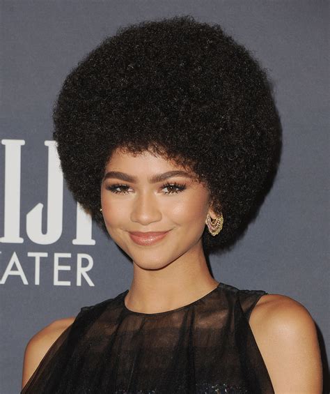 This haircut screams chic and the honey brown highlights just add to it. Zendaya Rocks an Afro Wig to the 2017 InStyle Awards | Allure