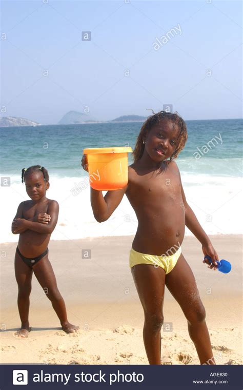 From the about us page Two young girls having fun on the beach rio brazil Stock ...