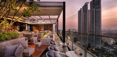 Perhaps the most famous bangkok rooftop bar, the sky bar towers above the city at an impressive height of 63 storeys (820 feet) and the views from the top looking out over for a sublimely glamorous experience head to the cru champagne bar on the rooftop of the centara grand hotel bangkok. Rooftop Bar Bangkok | Bangkok Novotel Sky On 20