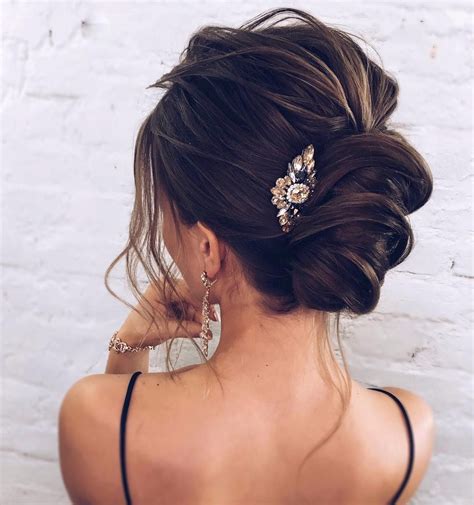 A sleek top and a small sided low bun for a timeless elegant look is suitable for medium. The Most Romantic Bridal Updos Wedding Hairstyles ...