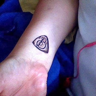 Forearm guitar tattoos design, forearm tattoos for girls. Guitar pick tattoo with my dad's initials | Tattoos, Tattoo for my son, Guitar tattoo