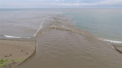 Michigan is the eleventh largest state in the united states lying in the great lakes and midwestern region. Pike river entering Lake Michigan - YouTube