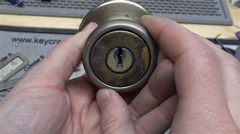 How to remove a lever door handle without screws? (377) How to Remove and Flip a Cylinder From a Kwikset ...