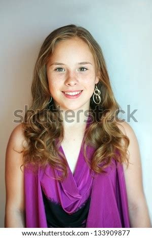 Tee ngirl sitting on old cart at train station. Beautiful Blondhaired 13 Years Old Girl Portrait Stock ...