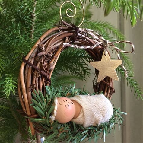 (baby jesus is face down.) fold like this: Baby Jesus Christmas Ornament Wreath | Christmas ornament wreath, Christmas ornaments, Christmas ...