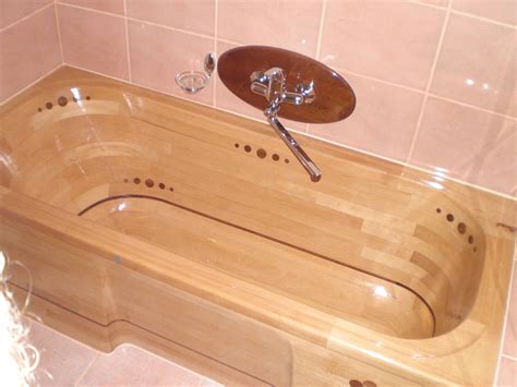 These art pieces are completely stabilized, waterproof and smooth to the touch. Mitja Narobe's wooden bathtub build