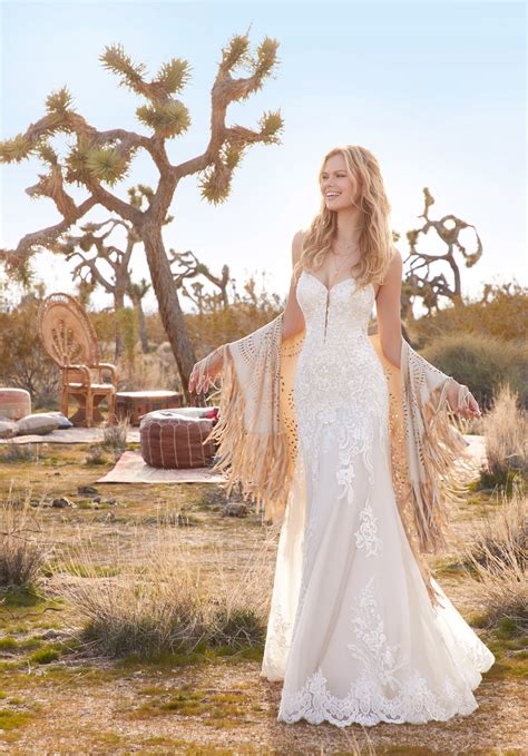 The dress is very nicely made and beautiful. Elaborately Beaded Embroidery on Net Wedding Dress | Morilee