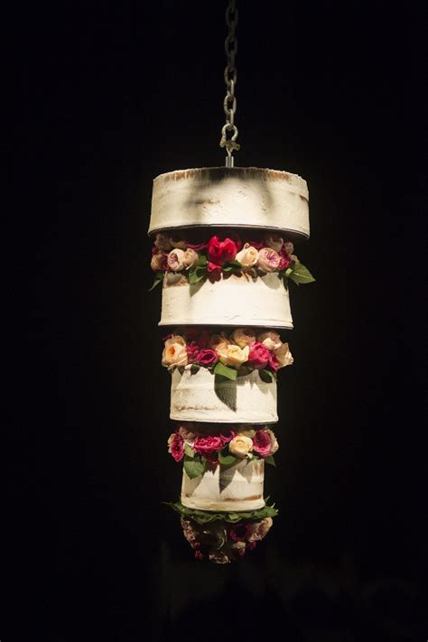 Made with lots of whipped cream, the vanilla flavored cake was decorated with crystal droplets. 7 Upside down wedding cakes,Hanging Chandelier cake