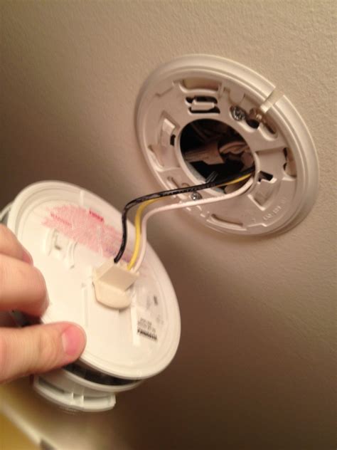 Use a step stool to reach the reset button. How To Change Battery In Smoke Detector Youtube