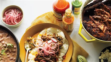 You just boil the meat until it falls off the bone, stir in the sauce and eat. Chile-Braised Pork Shoulder Tacos Recipe | Bon Appetit