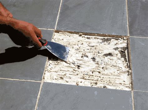 After waiting the recommended time period for the adhesive remover product, use your scraper to work up the loosened material. How to Replace a Slate Floor Tile