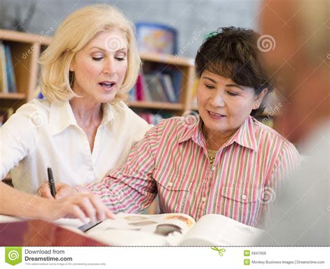 Mature lesson elaine melina and artur russian mature teacher 12 elena anathomy lesson mature teacher gives some great lessons f70 Tutor Assisting Mature Student In Library Stock Photo ...