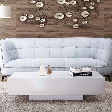 Taking the sleek, curved lines of modern times and combining it with open elegance. A glossy white modern coffee table for your mid-century ...