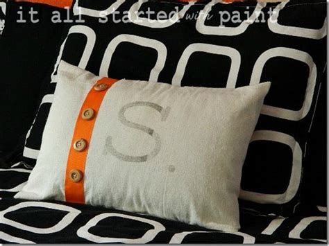 The boys have separate bedrooms. Teen Boy Bedroom in Orange, Gray, Black