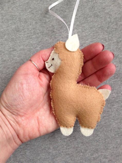 Best christmas gift for christmas, and llamas combined christmas 2021 accessories hats, ornaments, decorations, cards, outfits, ugly sweater. Llama Christmas Ornament in Felt | Etsy | Felt christmas ...