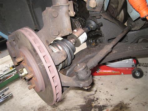 Your car's axle shaft may be called the half shaft or cv axle, and it connects the wheels and the transmission. Dodge Caravan Drive Axle / CV Joint Replacement | Flickr ...