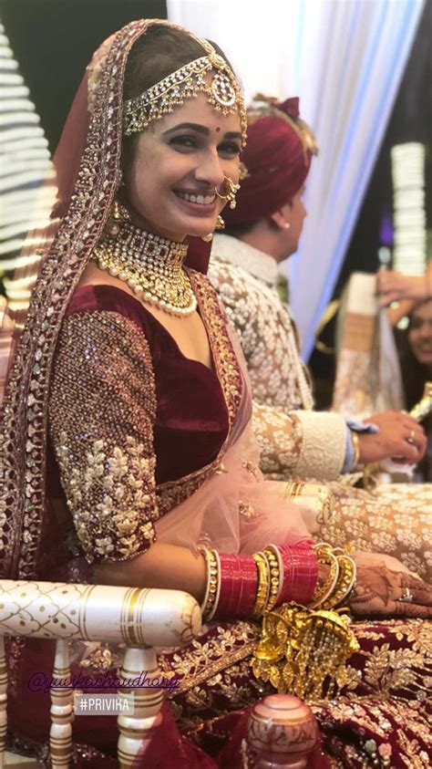 The bride and groom were seen dancing and Yuvika choudhary | Bridal lehenga red, Indian bridal ...