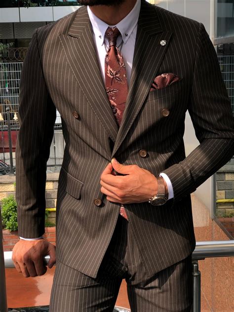 Top celebrities, successful businessmen, and political leaders can be seen wearing suits that cost more than regular cars. Buy Brown Slim Fit Pinstripe Suit by GentWith.com with ...
