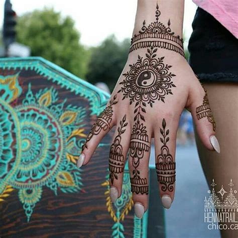 Henna tattoos are temporary tattoos are made from a dye prepared from the henna tree also known as the this hand henna tattoo looks like has been freshly done. Pin by Helen on Надо попробовать | Henna tattoo designs ...