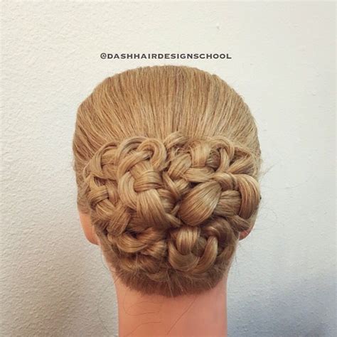 Separate the back section and do the wide braid. The Snake Bun | Hair trends, Hair designs, Hair styles