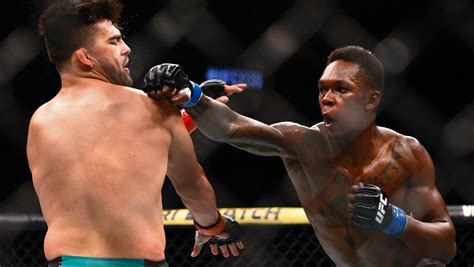 Ufc fighter israel adesanya breaks down his tattoos | gq sports. Israel Adesanya fires back at 'bully' Jon Jones as UFC ...