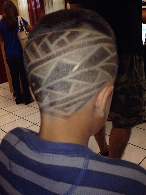 My son's haircut with tribal design. | Haircut designs ...