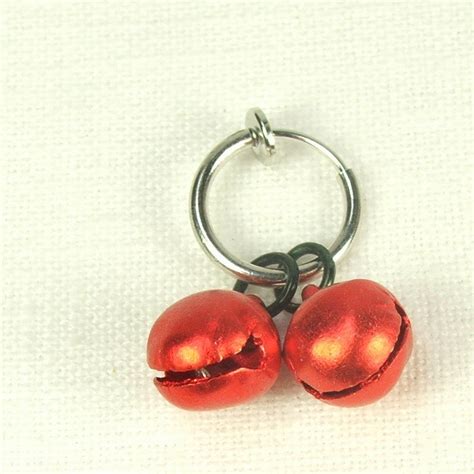 You can use captive rings to enhance the inner labia piercing. Non piercing ring with red bells, clit ring, labia jewelry ...