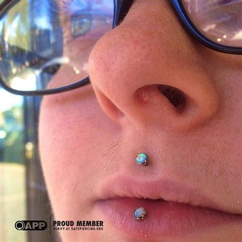 Add a bit of bling with our sleek and simple designs perfect for an edgy and alternative style. Philtrum and inverse vertical labret pierced at Sacred ...