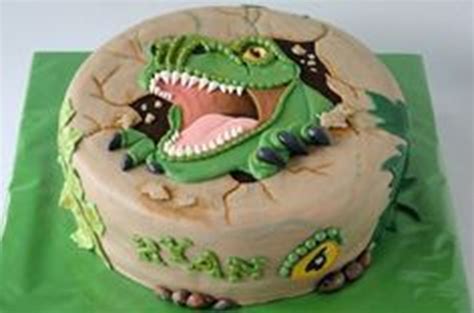Serve your dino on a large rectangular cheese slate or make a display board by covering a sturdy piece of cardboard with colorful wrapping. Dinosaur Cake Asda