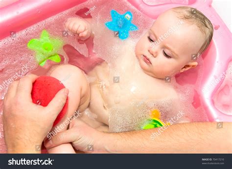 Find & download free graphic resources for kid bathing. Baby Taking A Bath Stock Photo 70417210 : Shutterstock