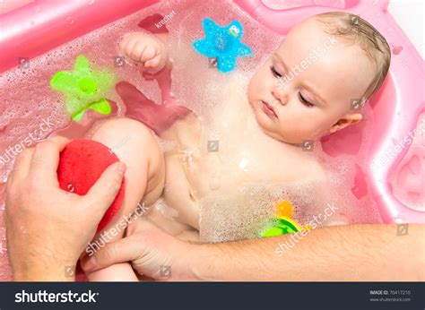 Bath taking baby bathtub child bubbles bathing kid bathroom happy royalty cleaning children toy care infant. Baby Taking A Bath Stock Photo 70417210 : Shutterstock