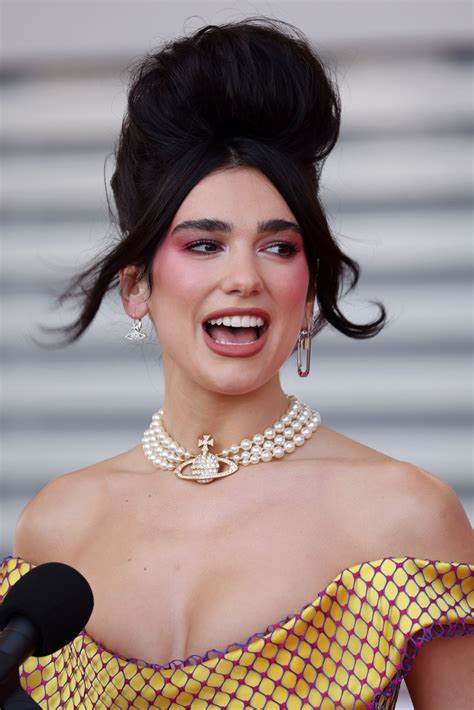 Music fans will find out the winners when the awards, hosted by jack whitehall dua lipa, arlo parks and 2020's brits rising star winner celeste are all nominated for female solo artist and mastercard album. Dua Lipa 2021 Brit Awards 2 | Satiny