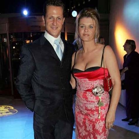 Michael schumacher, mercedes gp and his wife corina. Michael Schumacher's wife Corinna places 'lucky charm' at bedside for quick recovery