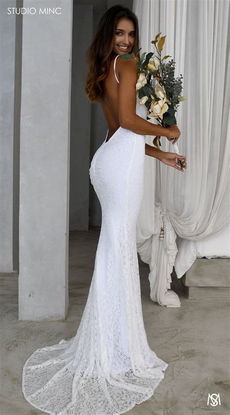 The back of your wedding dress can make a big statement (and is what your guests see during your vows). White Daring - STUDIO MINC - Rouched bottom, completely ...