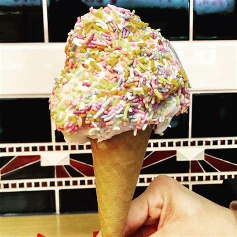 Sprinkles make food fun and exciting. Some good vegan vanilla ice cream and rainbow sprinkles ...