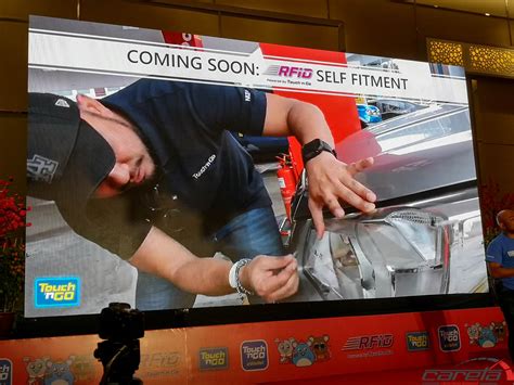 It allows users to make payments at over 280,000 merchant touch points via qr code; RFID Touch n Go bakal menyokong pembelian petrol, parkir ...