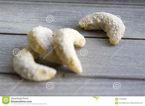 Kolachkes are traditional czech cookies filled with jam, cheese or nuts and dusted with powdered sugar. Traditional Czech Sweet Christmas Cookies, Vanilla Rolls With White Icing Stock Image - Image of ...