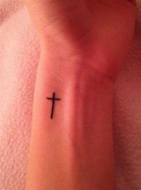 Cross tattoos on wrist meaning. Pin on Inspirations