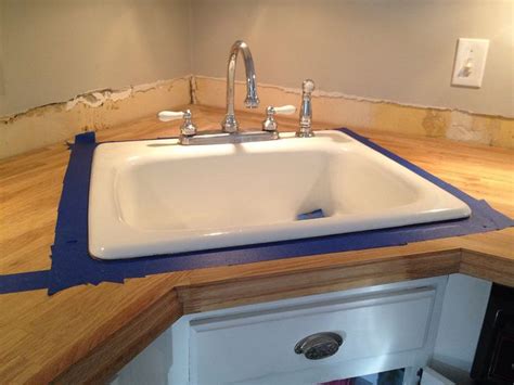 Most kitchens make heavy use of cabinets in one of two widths. Butcher block countertops with corner sink - like ours ...