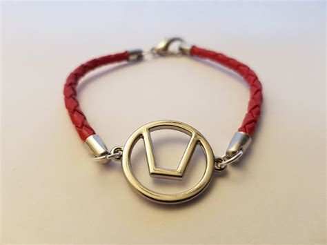 Pin on Swinger Jewelry with the Swinger Symbol