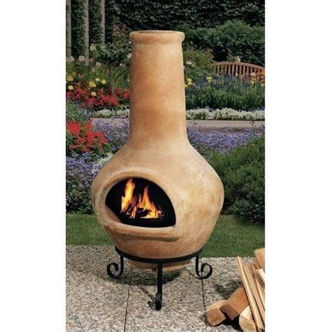 Wood burning faux stone fire column chimenea create a social hub in your backyard or patio create a social hub in your backyard or patio with the elegant danya b. Chiminea - Love this one | Chiminea, Clay fire pit, Outdoor fire pit seating