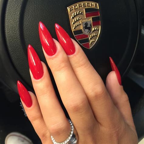 Red painted nails in old wood 3. Pinterest : @seaairraw | Red stiletto nails, Red acrylic ...