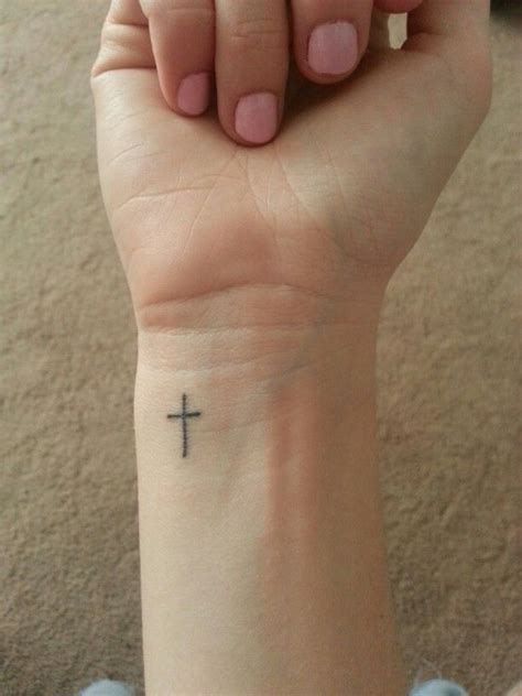 A small cross tattoo, whether it's located on the wrist, arm, or foot, will make a lasting impact, so don't shy away from the idea. 47 Stylish Cross Tattoos For Wrists
