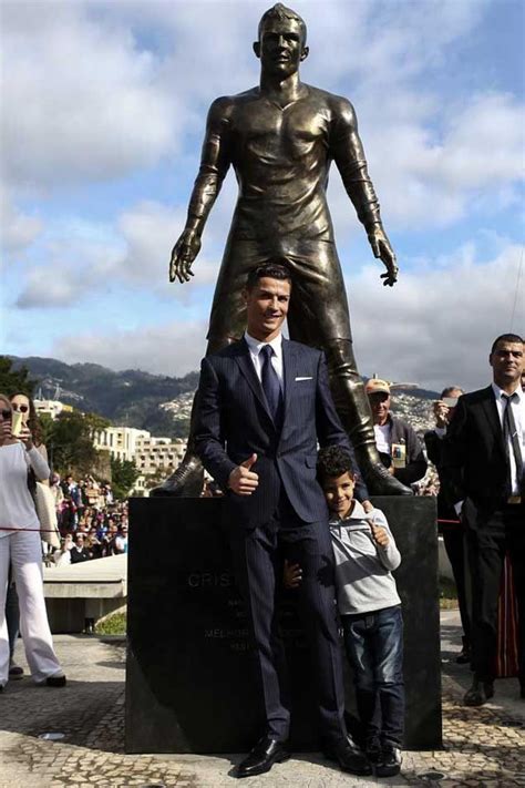 This is hand sculpted and not based on a scan. Cristiano and Junior during the unveling ceremony of the ...