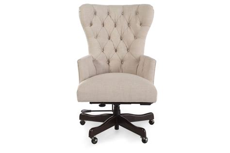 In our opinion, it just might be the best seat in the house. Button Tufted Swivel Desk Chair in Natchez Brown | Mathis Brothers Furniture