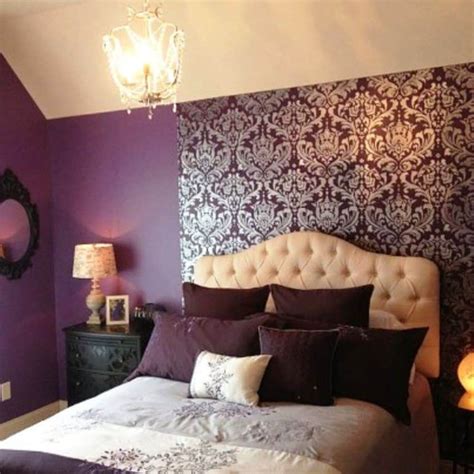 This houston house's guest bedroom is covered in a shimmery, pale purple wallpaper. Purple Bedroom With Chandelier And Damask Wallpaper ...