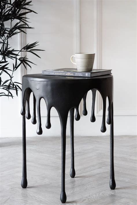 Buy round side tables in glass or metal top with melbourne and sydney wide fast metro delivery discover side tables in marble or wooden top to suit any bedroom lounge shop white, black and gold side table designs to look after your storage space. Matt Black Drip Side Table | Rockett St George in 2020 ...