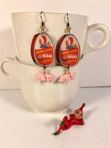 The easter bunny is a folkloric figure and symbol of easter which is seen as a rabbit bringing easter eggs. Canned Ham Earrings Easter Dinner Pink Pigs ham and cheese ...