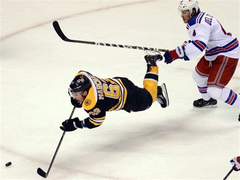 We regularly add new gif animations about and. Boston Bruins Brad Marchand, left, goes airborne while ...
